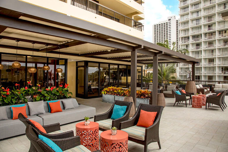 Seating and tables on open-air deck